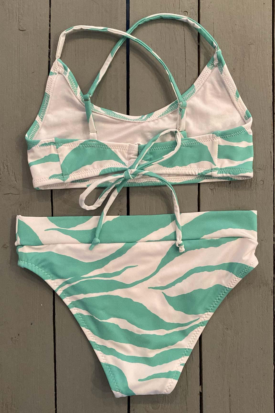 Adorable kids animal print bralette swimsuit. Top is adjustable and bottoms have a high, wide band bottom. They are made with the finest quality of soft and stretchy Lycra to achieve the best fit. @JillesBikinis
