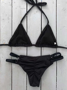 This black, laser cut triangle top is perfect to wear on your your next beach vacation. Made with the finest quality of soft and stretchy Lycra to achieve the best fit. Order yours today. @jillesbikinis  