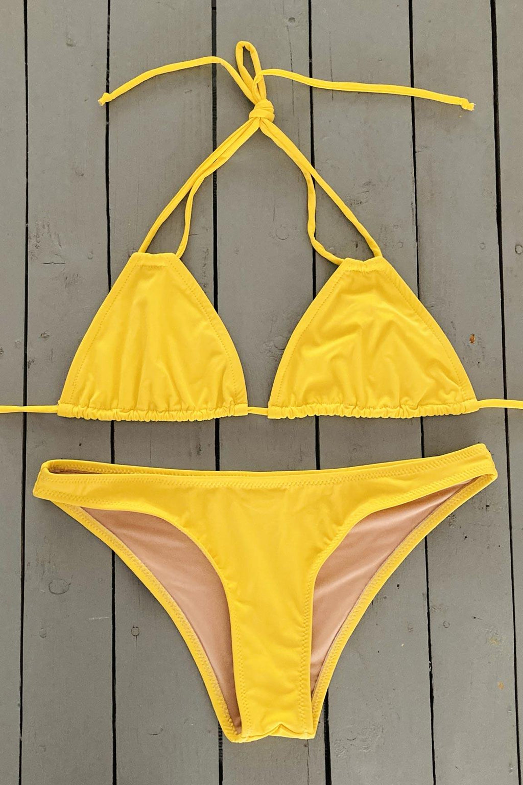 This sexy bright yellow, classic bottom bikini has a comfortable fit. Its made with the finest quality of soft and stretchy Lycra to achieve the best fit. Order yours today. @JillesBikinis