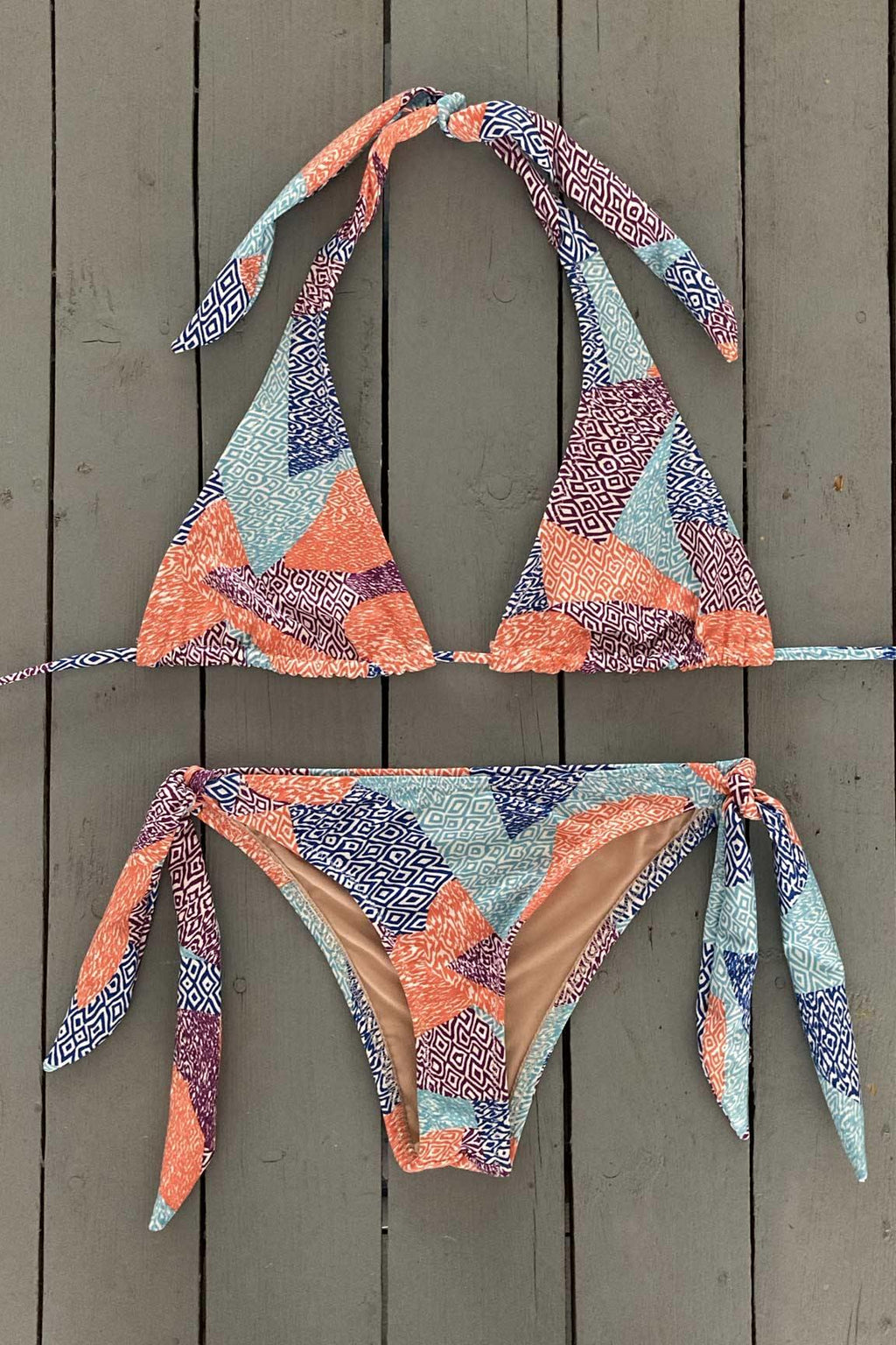 Upgrade your look in one of these multi color, adjustable halter bikini top. They are made with the finest quality of soft and stretchy Lycra to achieve the best fit. Place Order Now!