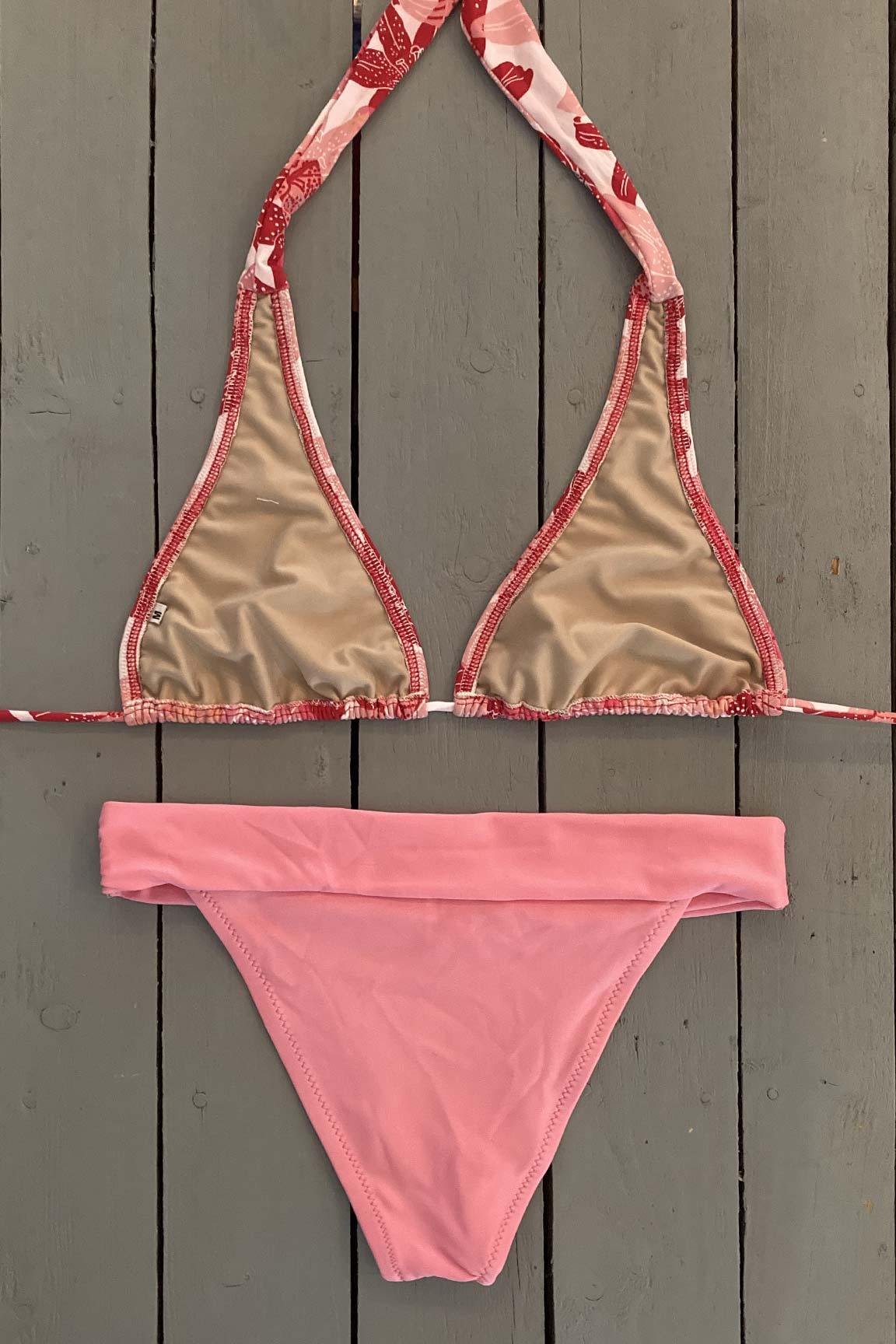 Upgrade your look with this pink floral halter bikini top. Made with the finest quality of soft and stretchy Lycra to achieve the best fit. Order yours today. @jillesbikinis  