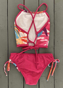 Splash around by the pool this summer in this super cute girls fuchsia adjustable, floral halter swimsuit top with tie bottoms. They are made with the finest quality of soft and stretchy Lycra to achieve the best fit. @JillesBikinis