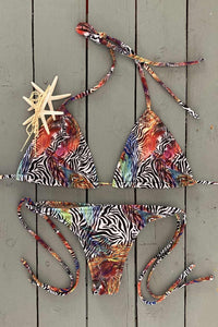 Go wild at the beach this summer in this zebra triangle bikini top. Made with the finest quality of soft and stretchy Lycra to achieve the best fit. Order yours today. @jillesbikinis 