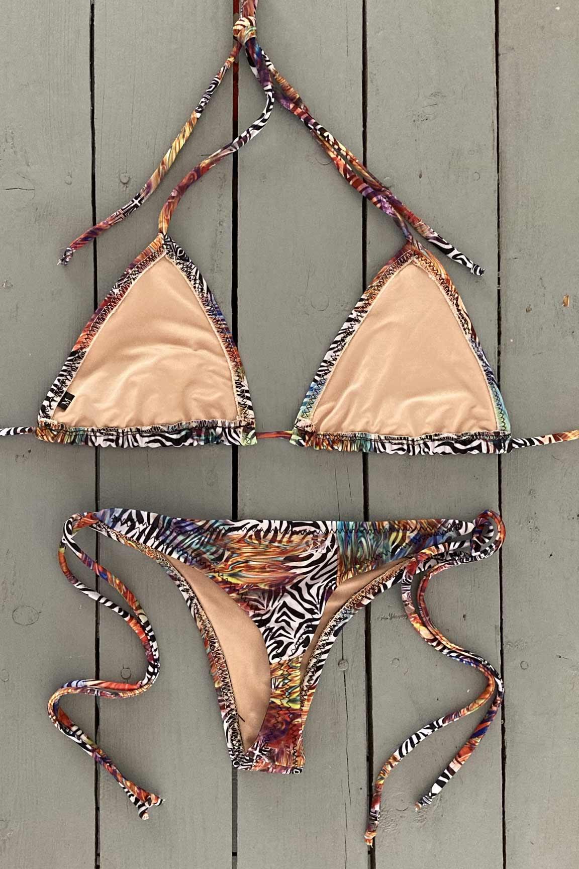 Go wild at the beach this summer in this zebra triangle bikini top. Made with the finest quality of soft and stretchy Lycra to achieve the best fit. Order yours today. @jillesbikinis 