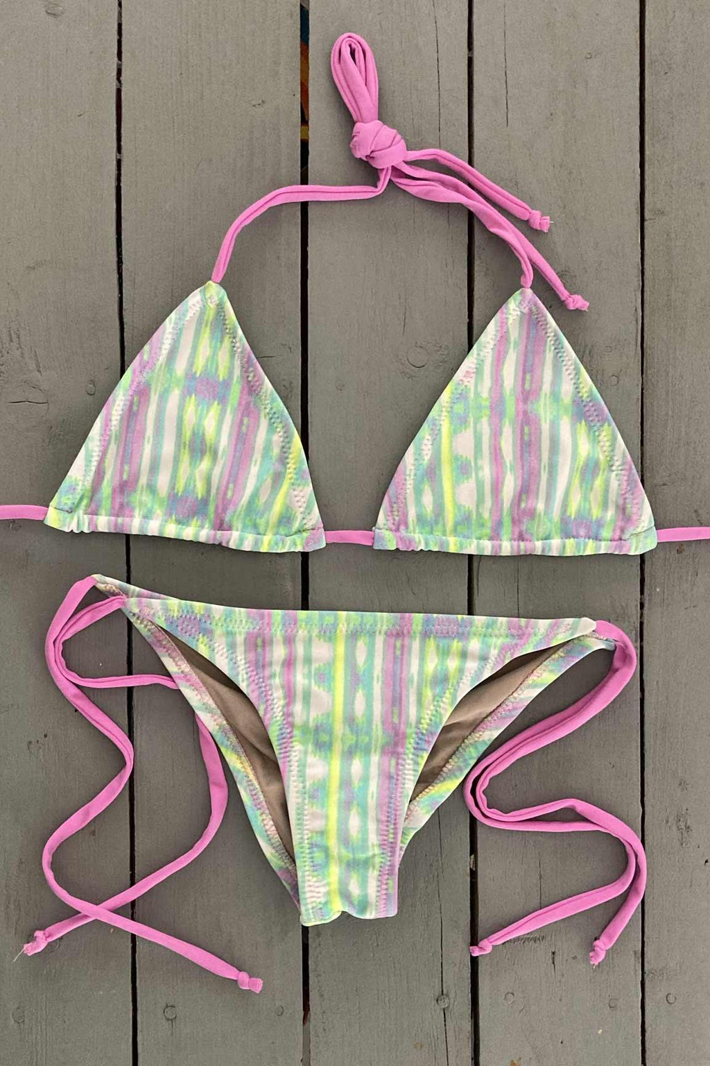 Splash around by the pool this summer in this super cute adjustable triangle bikini top. Made with the finest quality of soft and stretchy Lycra to achieve the best fit. Order yours today. @jillesbikinis  