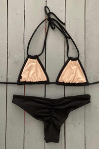 This sexy double string triangle top is adjustable and can be worn two different ways. Made with the finest quality of soft and stretchy Lycra to achieve the best fit. Order yours today. @JillesBikinis