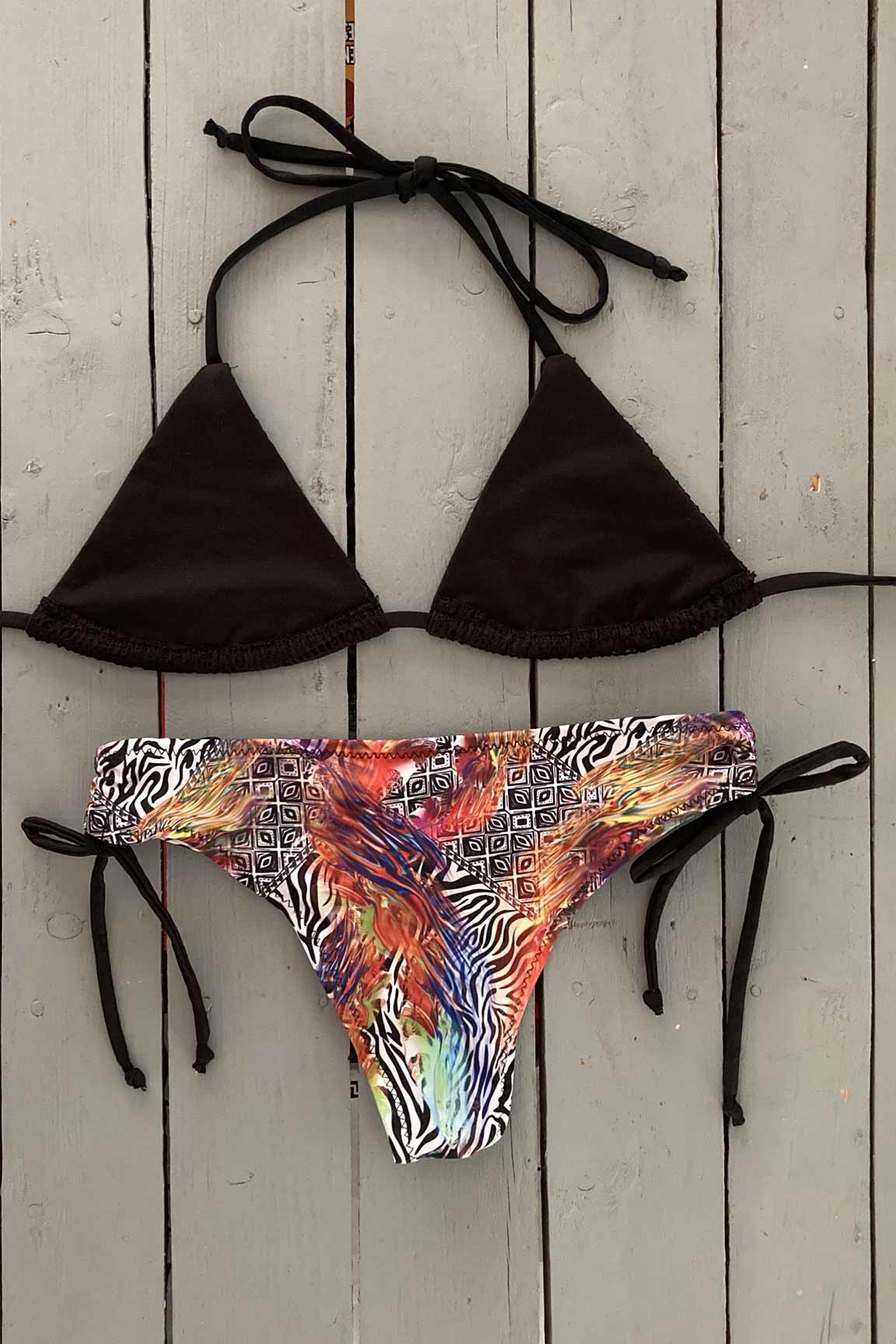 Black digital print define this triangle bikini top. Dare to be bold and wear with florals or zebra print bikini bottoms.