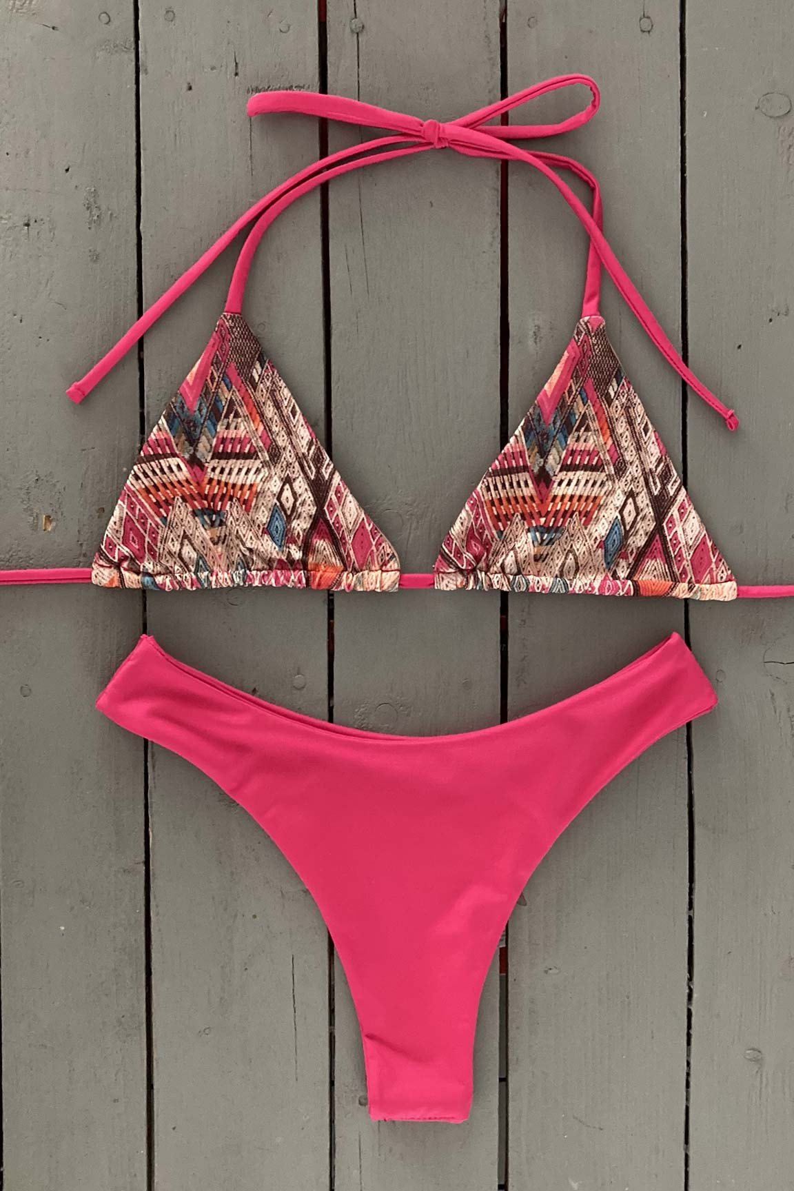 Splash around by the pool this summer in this super cute adjustable triangle bikini top. Made with the finest quality of soft and stretchy Lycra to achieve the best fit.  Compliment your look by matching with our thong bikini bottom. Order yours today. @jillesbikinis 