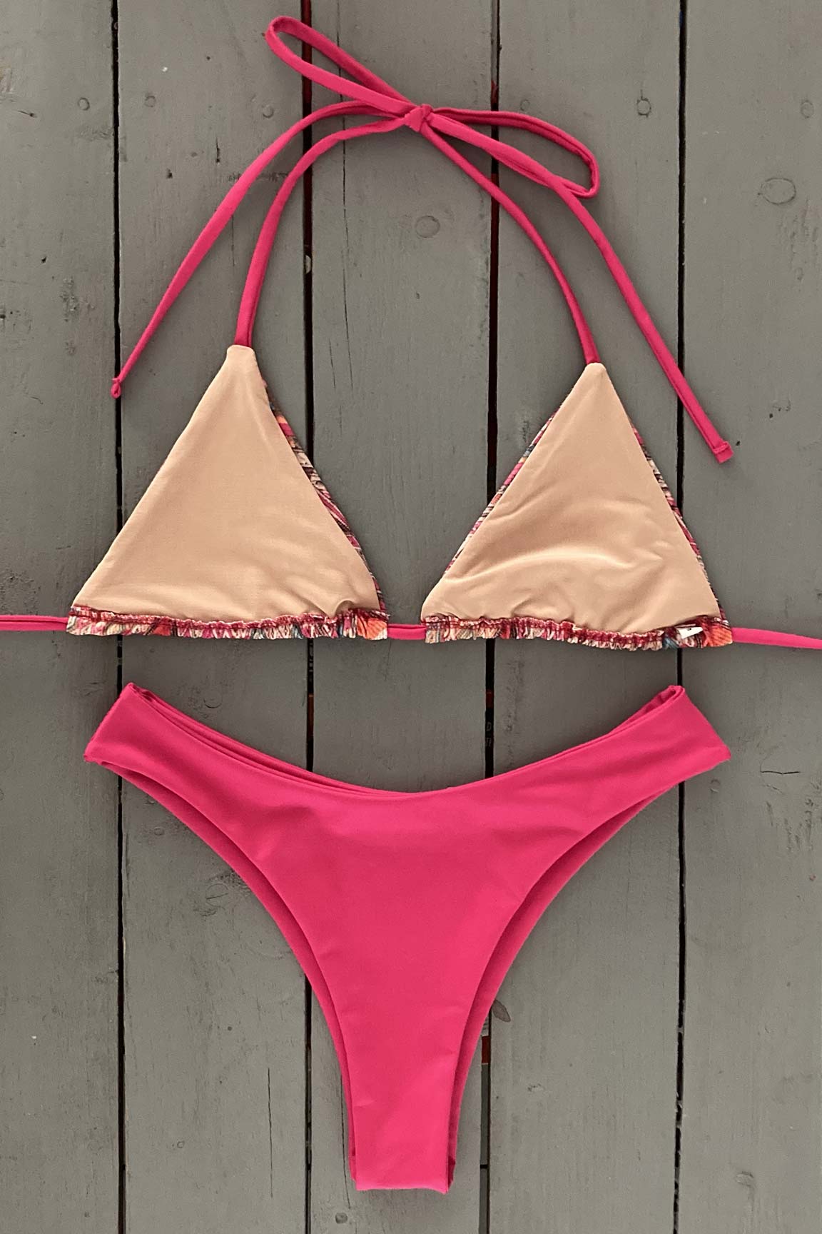 Splash around by the pool this summer in this super cute adjustable triangle bikini top. Made with the finest quality of soft and stretchy Lycra to achieve the best fit.  Compliment your look by matching with our thong bikini bottom. Order yours today. @jillesbikinis 