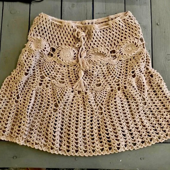 Elegant handmade crocheted skirt. This skirt is made with 100% Diva Stretch Yarn that is shipped in from Turkey and made by a very talented woman who crochets all my skirts and sarongs with lots of love. 